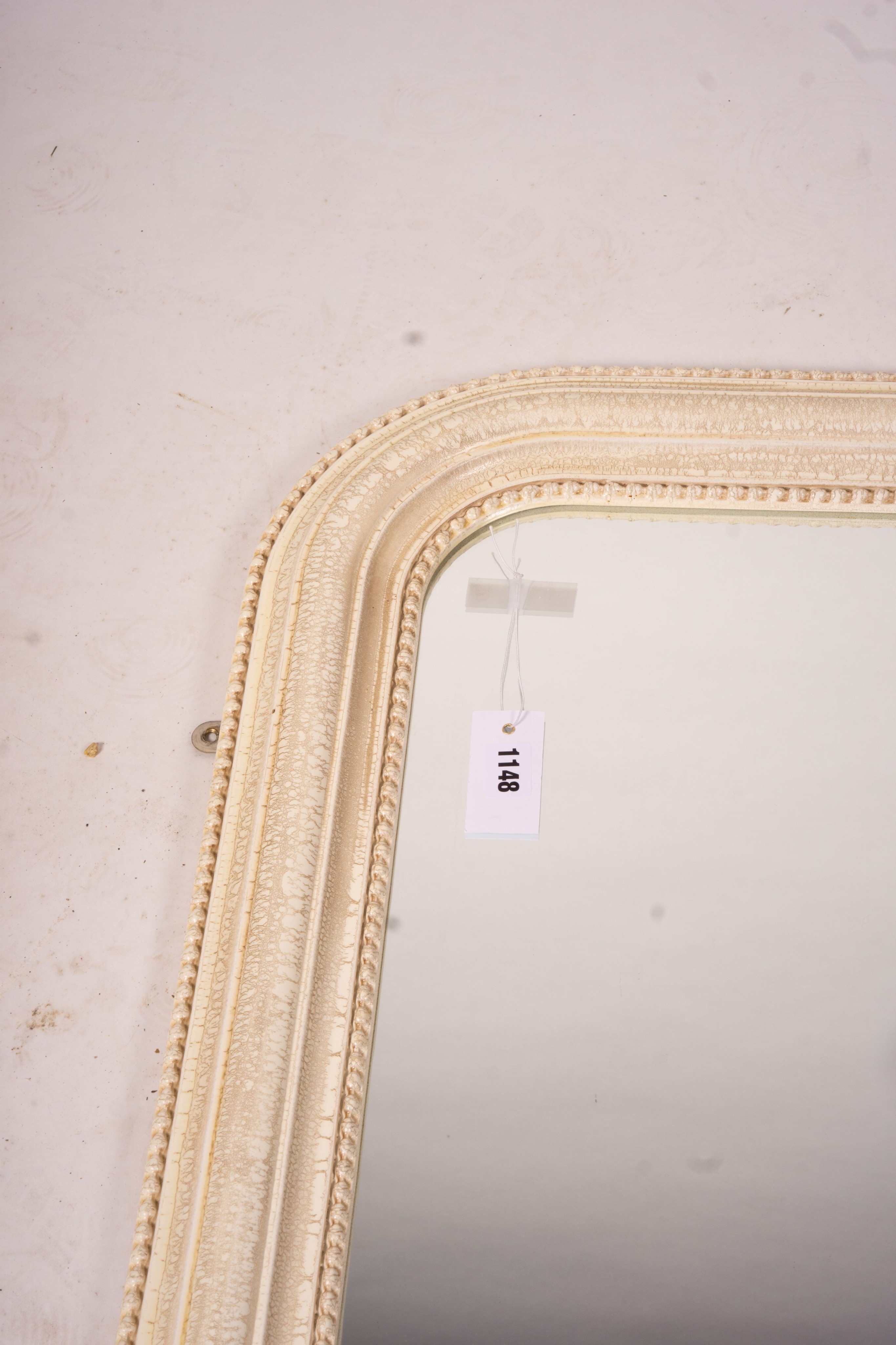 A Laura Ashley overmantel mirror, W.86cm H.110cm